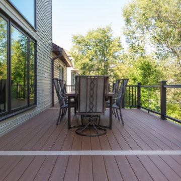 AZEK Decking with Cable Railing, Unilock Patio, Water Proof Ceiling & Landscape