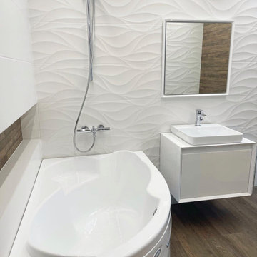 Master Bathroom with white textured and wood-patterned tiles