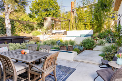 Photo of a coastal partial sun backyard landscaping in Los Angeles.