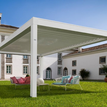 Adjustable motorized louvered pergola awnings