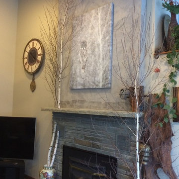 Bringing outside in with large Owl canvas and Birch Trees on Fireplace Wall