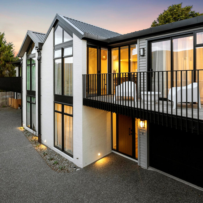 A contemporary upmarket townhouse development with 3 double storey units
