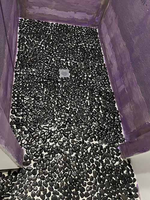 Grouting pebble tiles