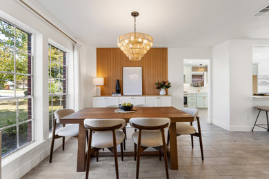 Dining room - transitional dining room idea in Houston