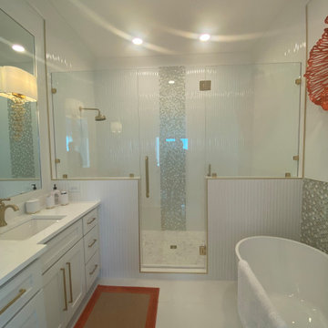 Stunning Bathroom with wavy tiles and penny round mosaic