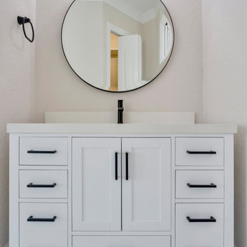 Striking Custom Vanity with Crisp White Finish and Dual Storage