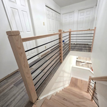 Horizontal Stair Railing with Red Oak T-Rail and Black Metal Bars