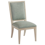 Barclay Butera Furniture - Eastbluff Side Chair - The classic design of the Eastbluff dining chair marries a wooden frame, in either the Sandstone or Sailcloth finish with welted upholstered panels on the inside and outside back of the piece. The design comes standard in the Ventura pattern 423311 but is also available in custom fabrics.