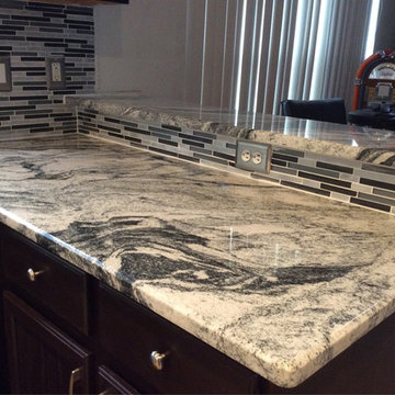 Silver Cloud Granite Countertops with Backsplash Tiles