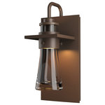 Hubbardton Forge - Erlenmeyer Medium Outdoor Sconce, Coastal Bronze Finish, Clear Glass - Inspired by the flat-bottomed Erlenmeyer flask, our outdoor sconce provides the catalyst for your design chemistry. The thick, clear blown-glass flask is encircled by a metal collar which is in turn, embedded in a metal plate.