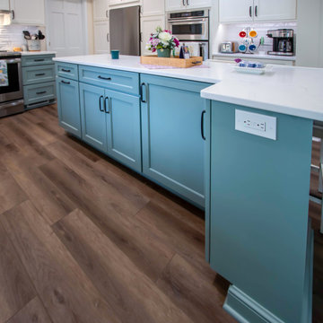 Custom Two-Toned Green and White Kitchen with Laventa Carrara Quartz Countertops