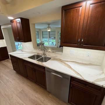 Seamless Style With Cinnamon Cabinets & Quartz Countertops