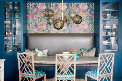 Inspiration for a transitional dining room remodel in Charlotte with multicolored walls