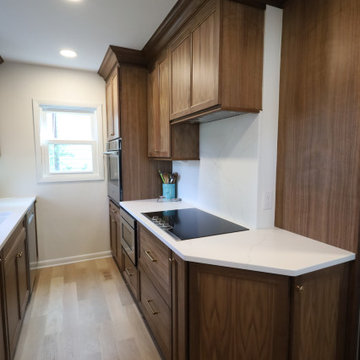 Rich & Refined: Custom Walnut Kitchen Remodel with White Quartz & Oak Flooring