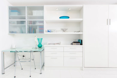 Example of a transitional home office design in Other