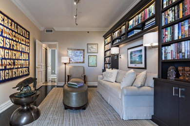 Example of a large transitional formal and enclosed dark wood floor living room design in Miami with beige walls, no fireplace and no tv