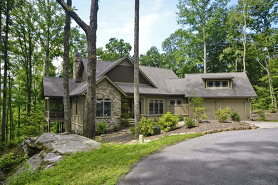 Example of an arts and crafts exterior home design in Other