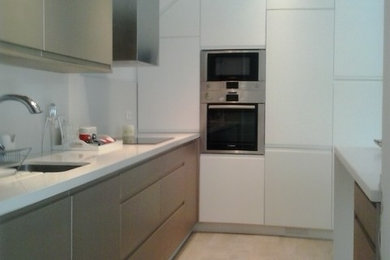 Example of a transitional kitchen design in Malaga