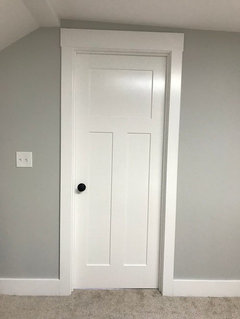 Help with sizing a sliding barn door over an opening with trim