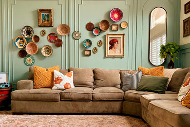 Eclectic wall paneling family room photo in Los Angeles with green walls