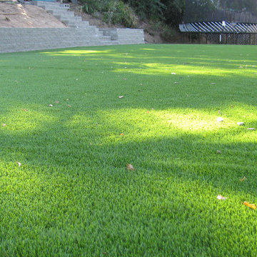 Low angle shot of versalok block wall at turf sports field