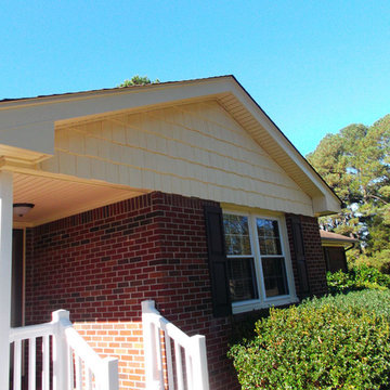 After: Updated Siding, Soffit and Porch Railing