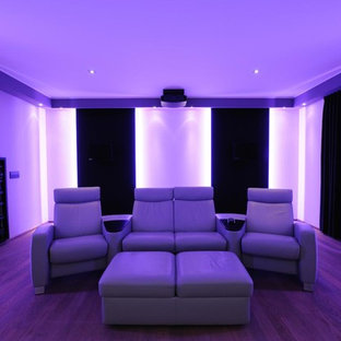 Inspiration for a contemporary home theater remodel in Cologne