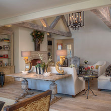 table behind sofa in "bar area"