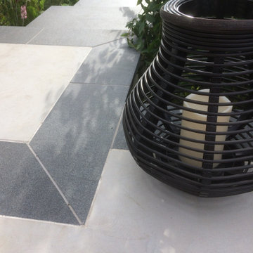 Black Granite planks and Pearl White Sandstone detail