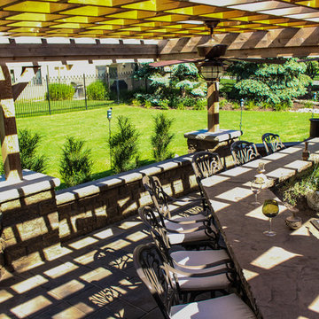 Overview of Outdoor Kitchen with Foundation Wall and Paver Patio