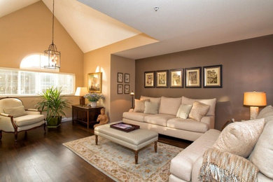 Inspiration for a mid-sized transitional open concept dark wood floor living room remodel in Vancouver