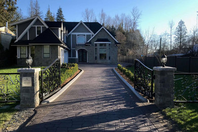 Mid-sized trendy two-story house exterior photo in Other