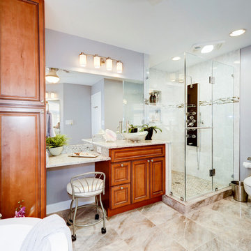 Elegant Master Bathroom Remodel with Quartz-Granite Hybrid Vanity and Spa Shower