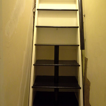 Storage ships ladder in a brownstone walk-up