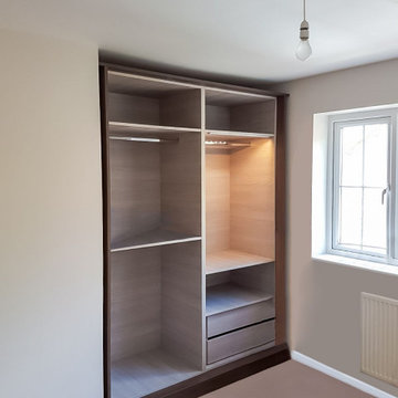 Stunning Built-in Sliding Wardrobes in a Rich Brown Finish in Barnet