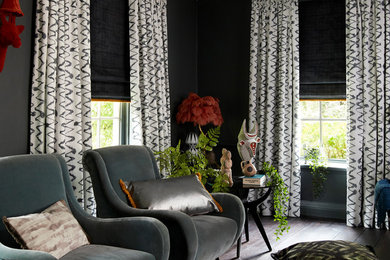 Wolfe Smoulder curtains and Cley Mole Roman blind with Colette Soleil fringing