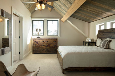 Example of a mid-sized trendy guest carpeted and beige floor bedroom design in Tampa with beige walls