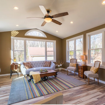 Lots of windows, ceiling fan and recessed lights are great additions