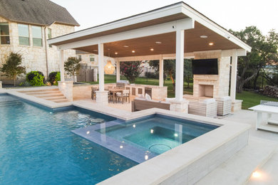 Example of a mid-sized minimalist backyard custom-shaped pool design in Austin