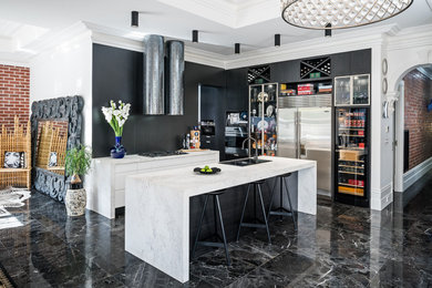 Design ideas for a mid-sized contemporary l-shaped open plan kitchen in Melbourne with a double-bowl sink, flat-panel cabinets, black cabinets, marble benchtops, black splashback, stone slab splashback, stainless steel appliances, marble floors, with island, black floor and white benchtop.