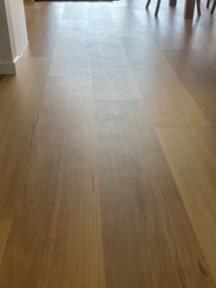 Accidentally Used Spray Polisher on my LVP to clean dog urine, thinking it  was just a spray cleaner. When will this fade? : r/Flooring