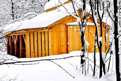 Example of a transitional exterior home design in Manchester
