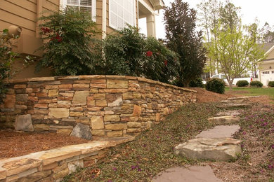 Mid-sized traditional front yard partial sun garden in Raleigh with a garden path and natural stone pavers.