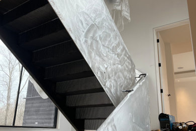 Modern aluminum stairs painted in black.