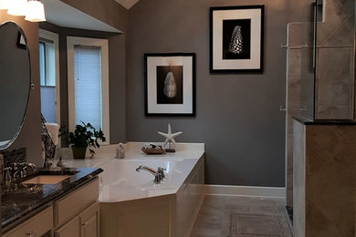 Open shower - traditional master beige tile and ceramic tile ceramic tile open shower idea in Cleveland with raised-panel cabinets, gray walls and an undermount sink