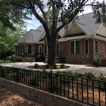 Brick knee wall with aluminum pickets