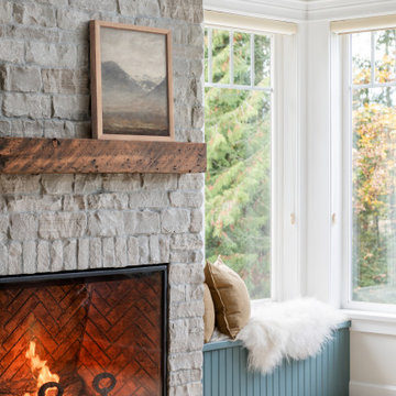 Stone Fireplace Detail with Integrated Window Seat – Modern Heritage Living Room