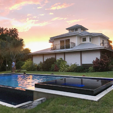 Modern pool with custom recycled glass mosaic combination