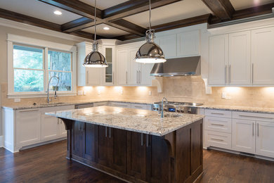 Inspiration for a large timeless u-shaped dark wood floor open concept kitchen remodel in Atlanta with an undermount sink, shaker cabinets, white cabinets, granite countertops, beige backsplash, subway tile backsplash, stainless steel appliances and an island