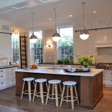 Kitchen with White Cabinets and Black Countertops